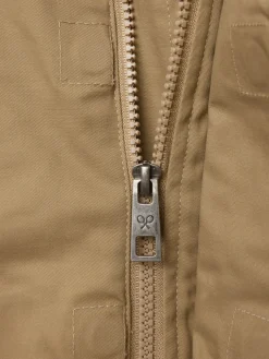 Abrigo kids capucha bolsillos beige medio