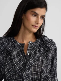 Blusa chorreras cuadros negros