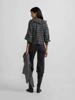Blusa chorreras cuadros negros