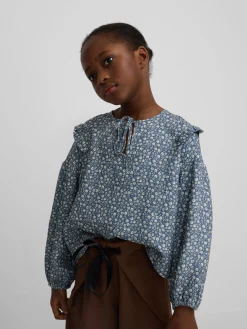 Blusa girl estampado flores azul claro