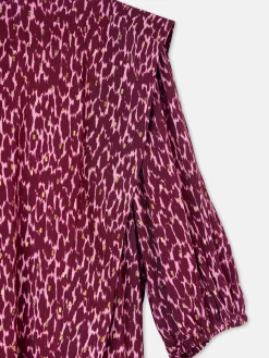 Blusa manga corta estampado lurex morados