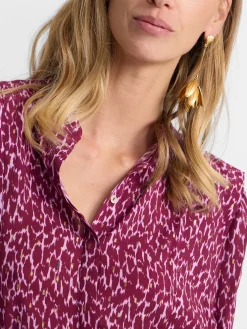 Blusa manga corta estampado lurex morados