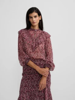 Blusa volante estampado animal print burdeos
