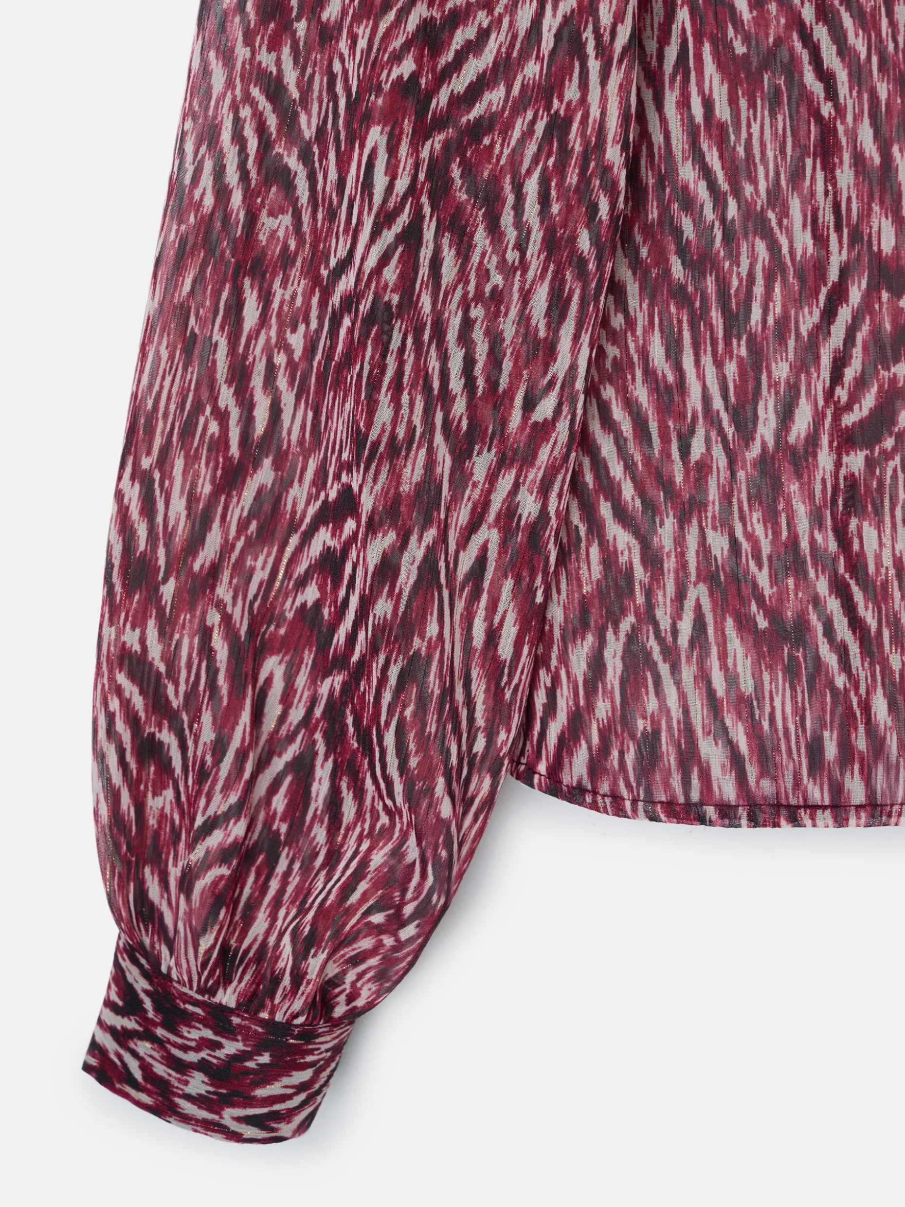 Blusa volante estampado animal print burdeos