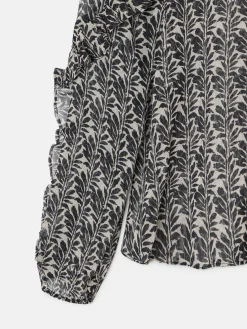 Blusa volantes estampado negros
