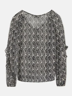 Blusa volantes estampado negros