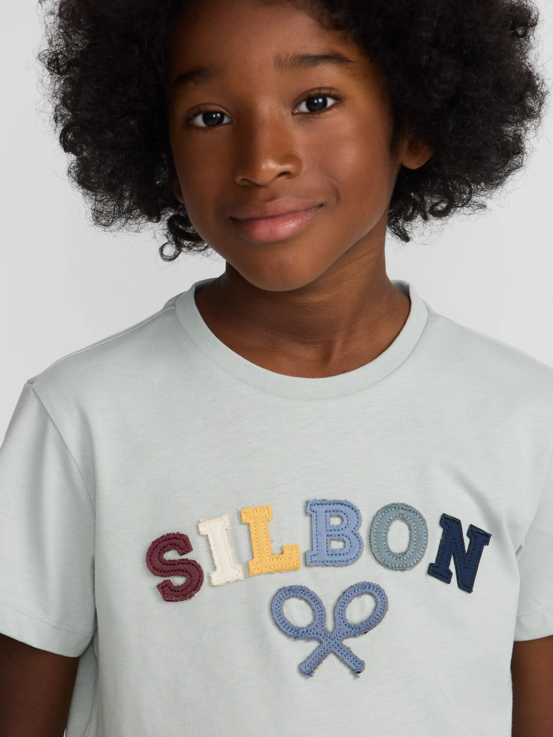 Camiseta kids raqueta media multicolor verde