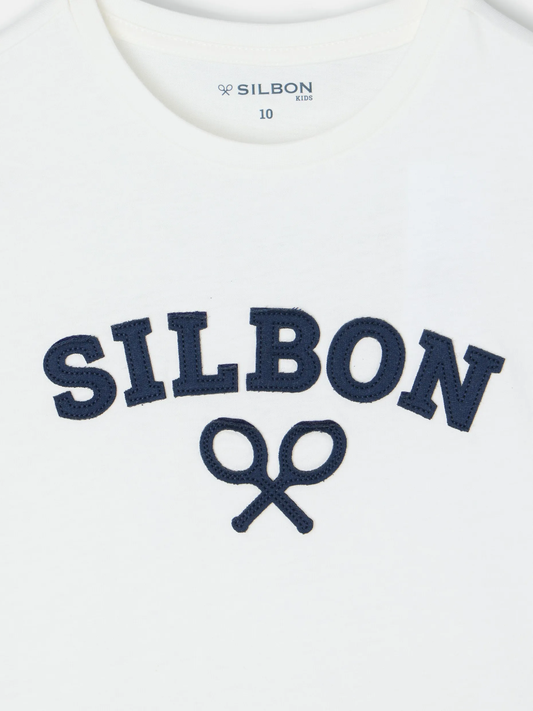 Camiseta kids raqueta media blanca