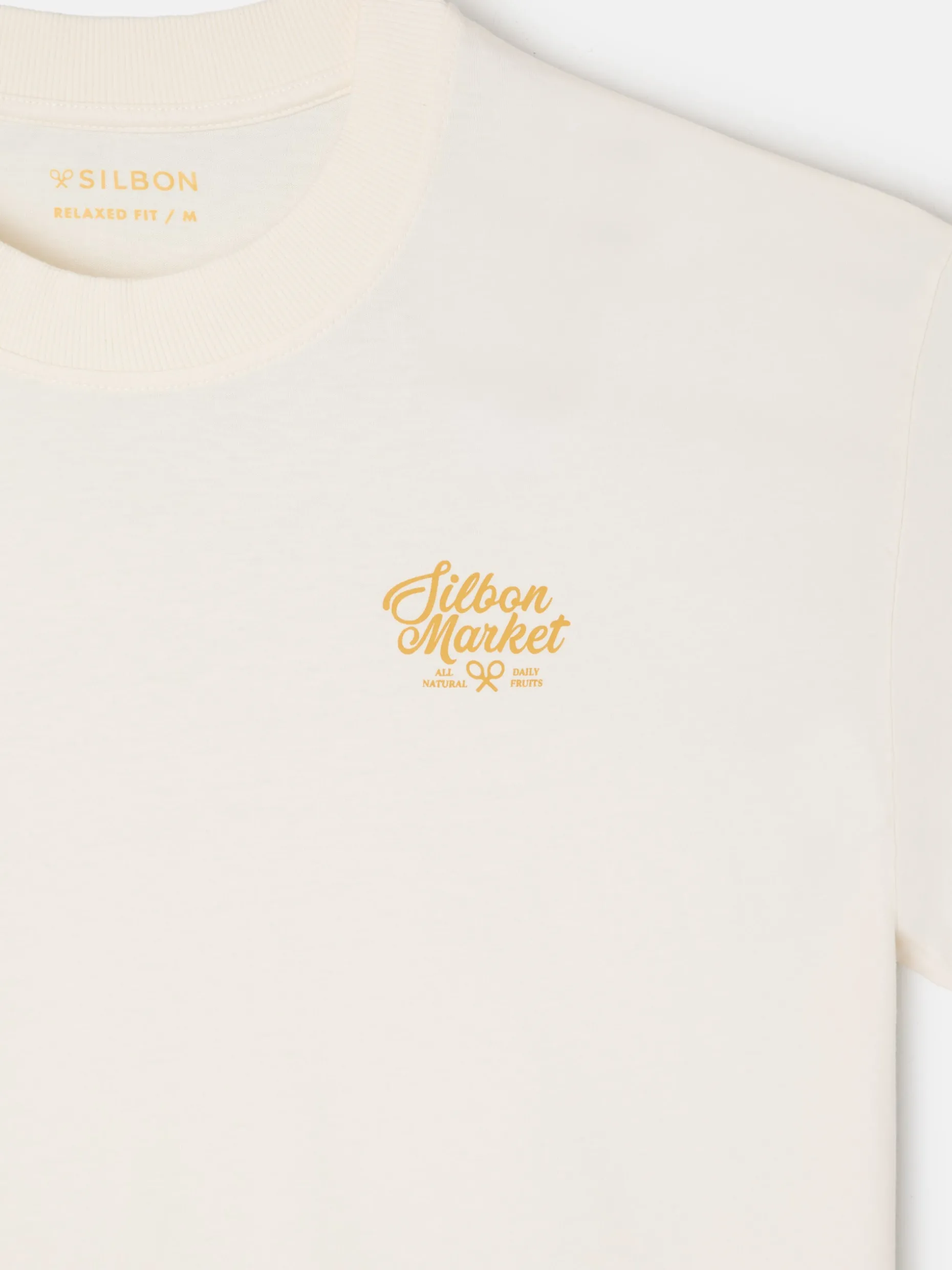 Camiseta relaxed fit market crema