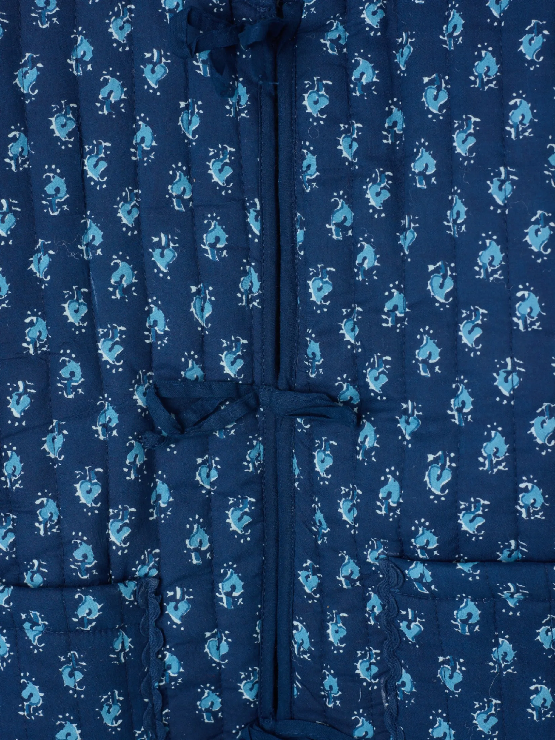 Chaqueta girl acolchada lazos estampado azul