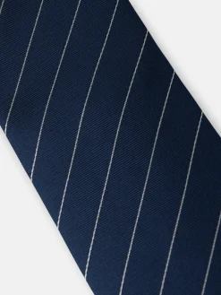 Corbata mini rayas raqueta azul marino