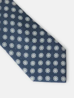 Corbata motivo flor azul marino
