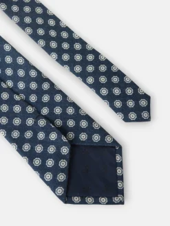 Corbata motivo flor azul marino