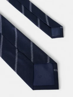 Corbata motivo franja raquetas azul marino