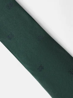Corbata motivo geometrico raquetas verde