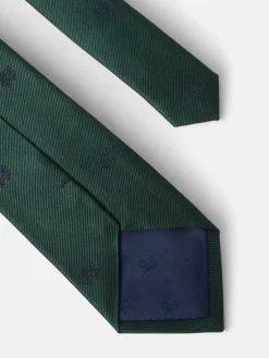 Corbata motivo geometrico raquetas verde