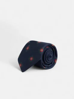Corbata seda motivo geometrico azul marino