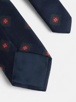 Corbata seda motivo geometrico azul marino