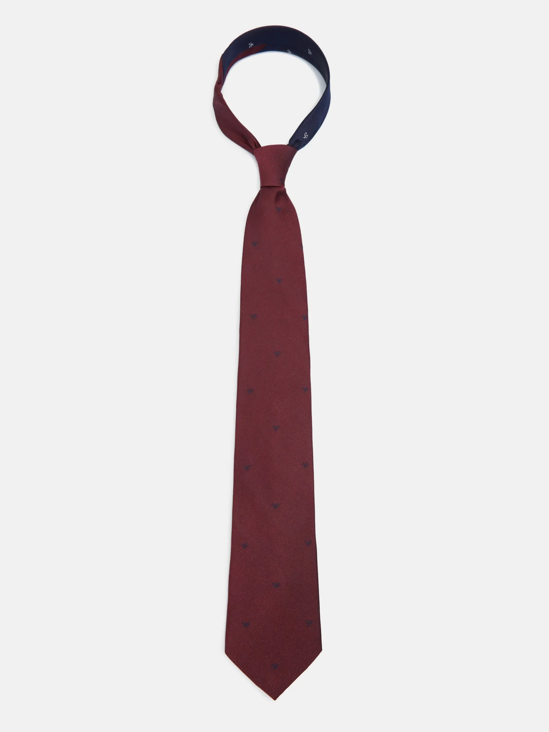 Corbata silbon motivos raquetas burdeos