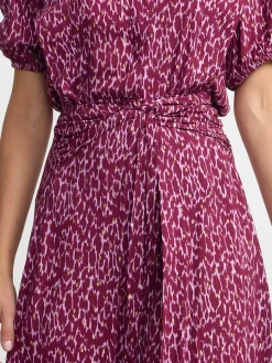 Falda midi asimetrica estampado lurex morados