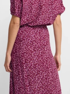 Falda midi asimetrica estampado lurex morados