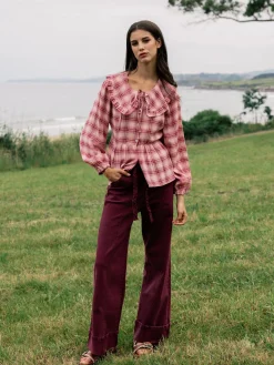 Pantalon denim cinturon trenza granate