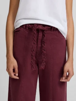 Pantalon denim cinturon trenza granate