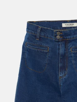 Pantalon denim flare bolsillos