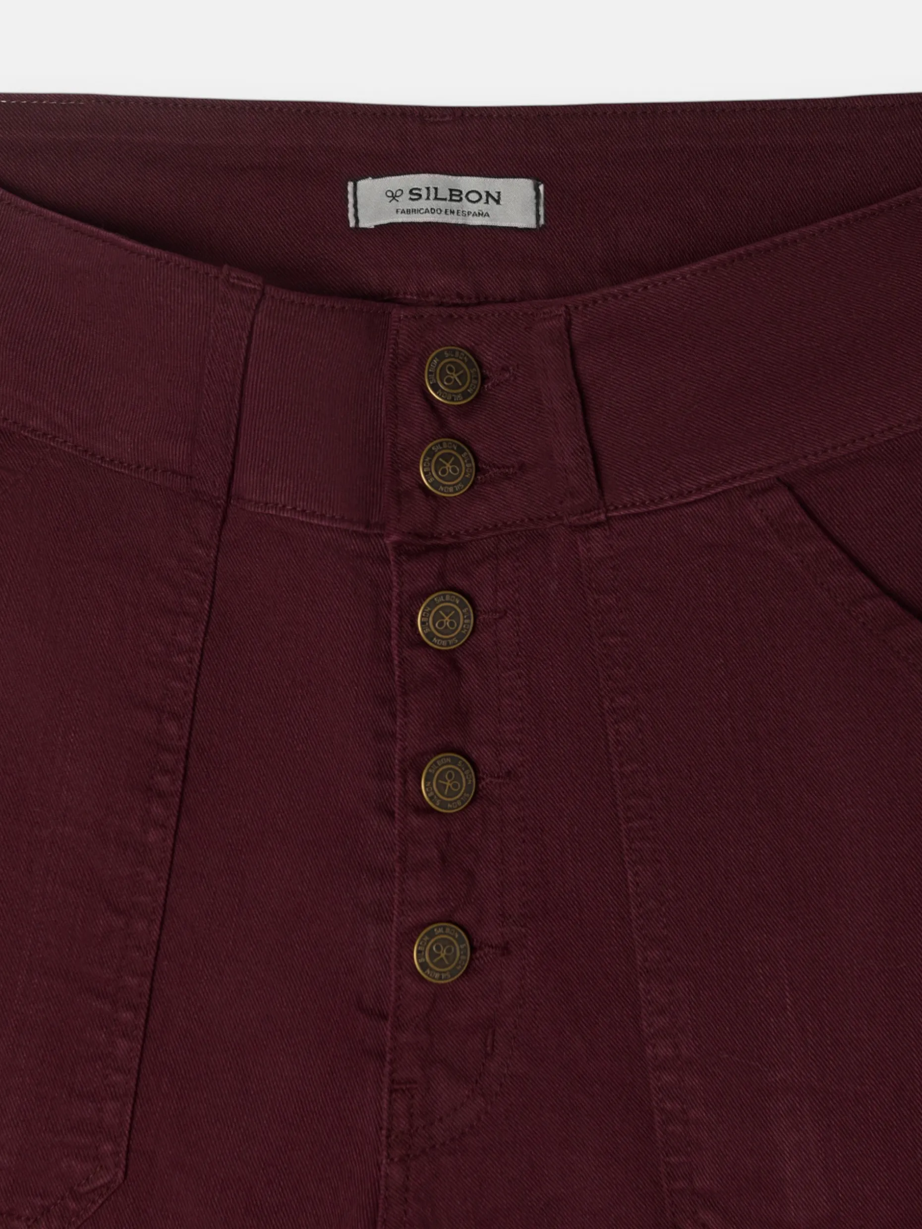 Pantalon denim vuelta burdeos