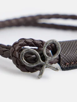 Pulsera piel trenzada detalle raqueta