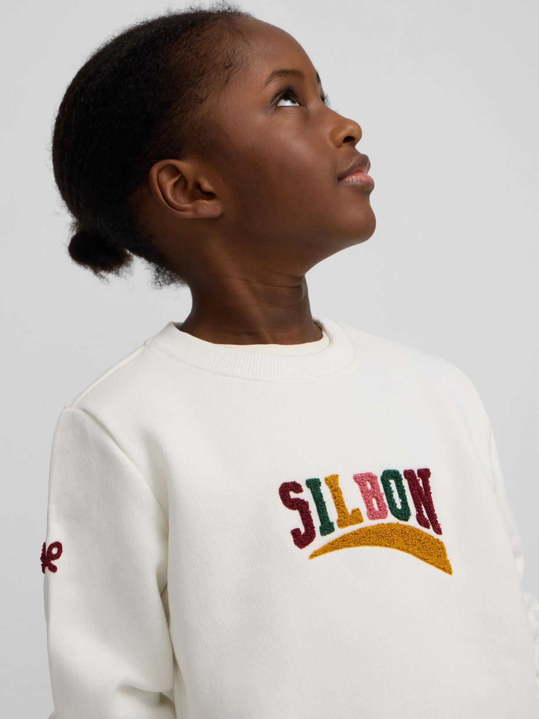 Sudadera girl letras silbon cruda