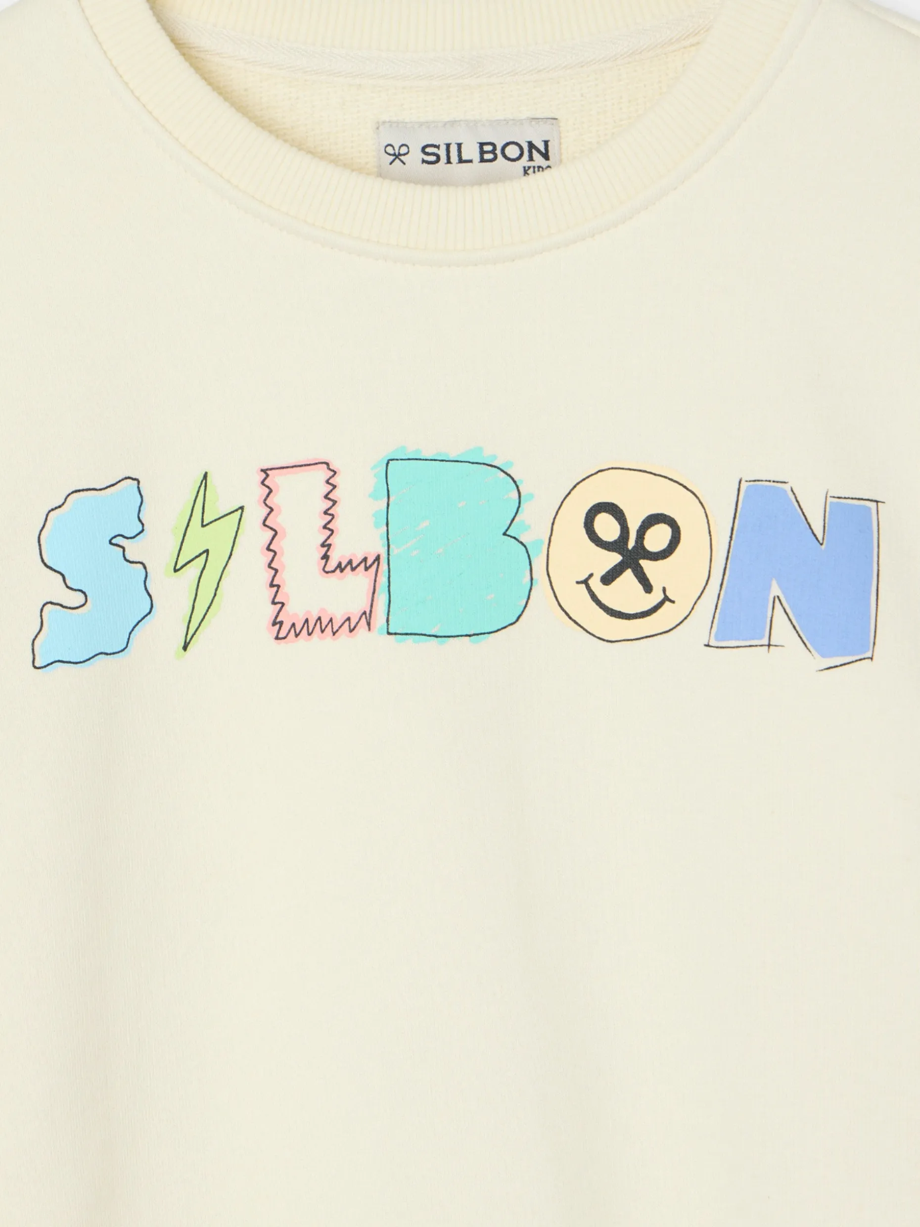 Sudadera kids letras silbon crema