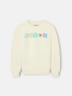 Sudadera kids letras silbon crema