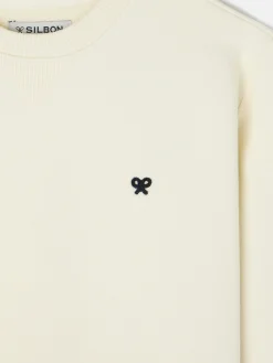 Sudadera minilogo crema