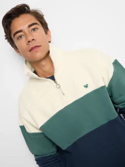Sudadera relaxed fit media cremallera bloques azul verde
