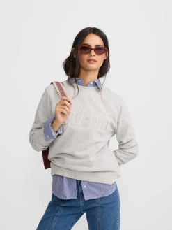 Sudadera woman silbon tachas gris
