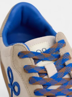 Zapatilla raqueta beige y azul