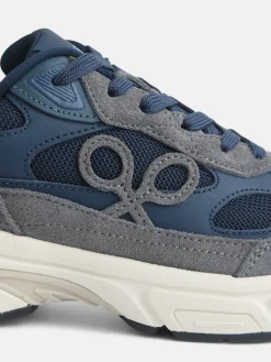 Zapatilla running tono azul