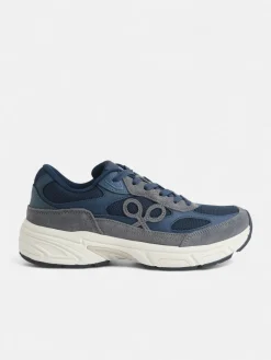 Zapatilla running tono azul