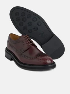 Zapato clasico piel perforado burdeos