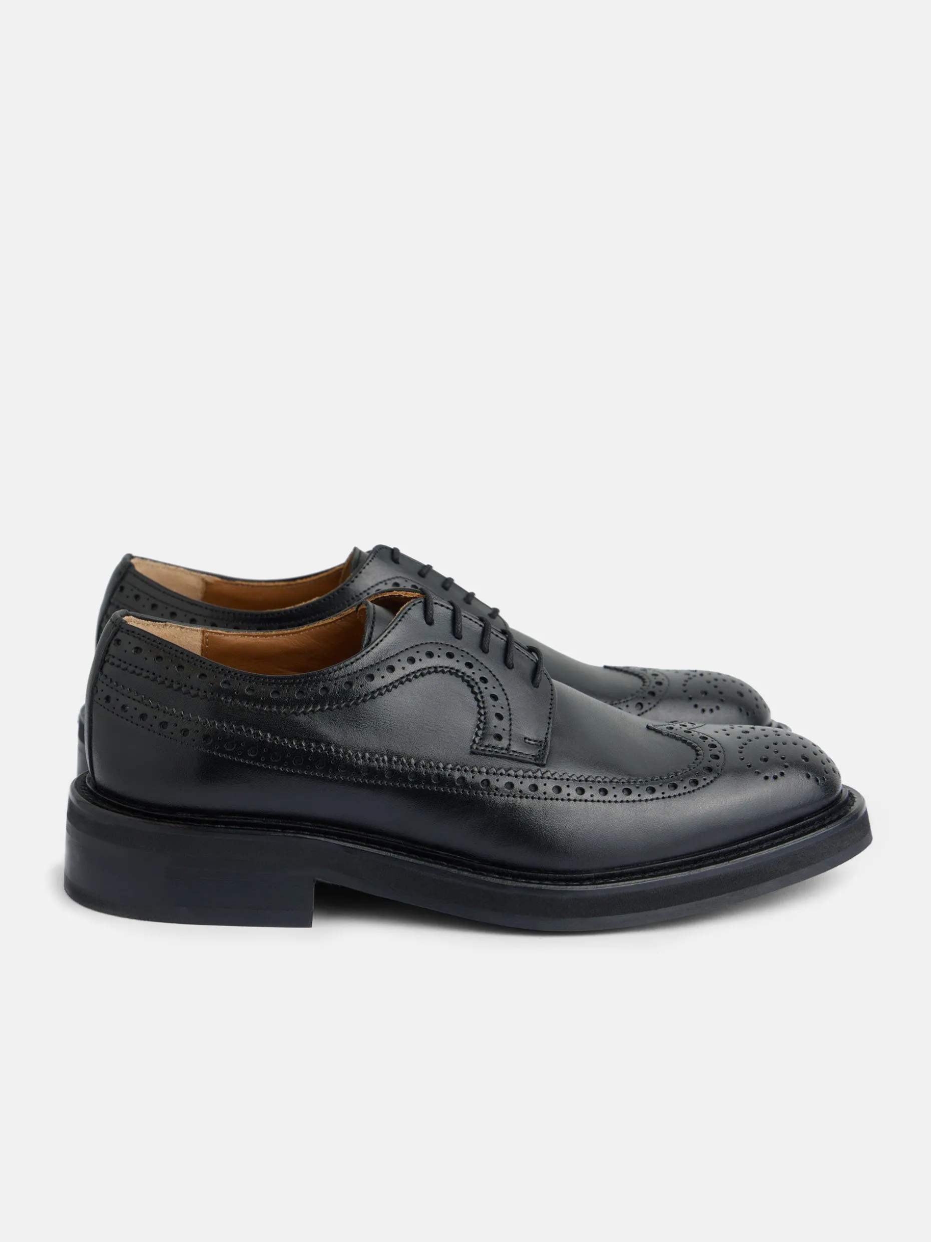 Zapato clasico piel perforado negro