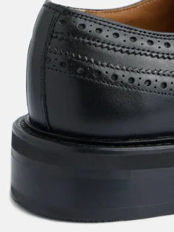 Zapato clasico piel perforado negro