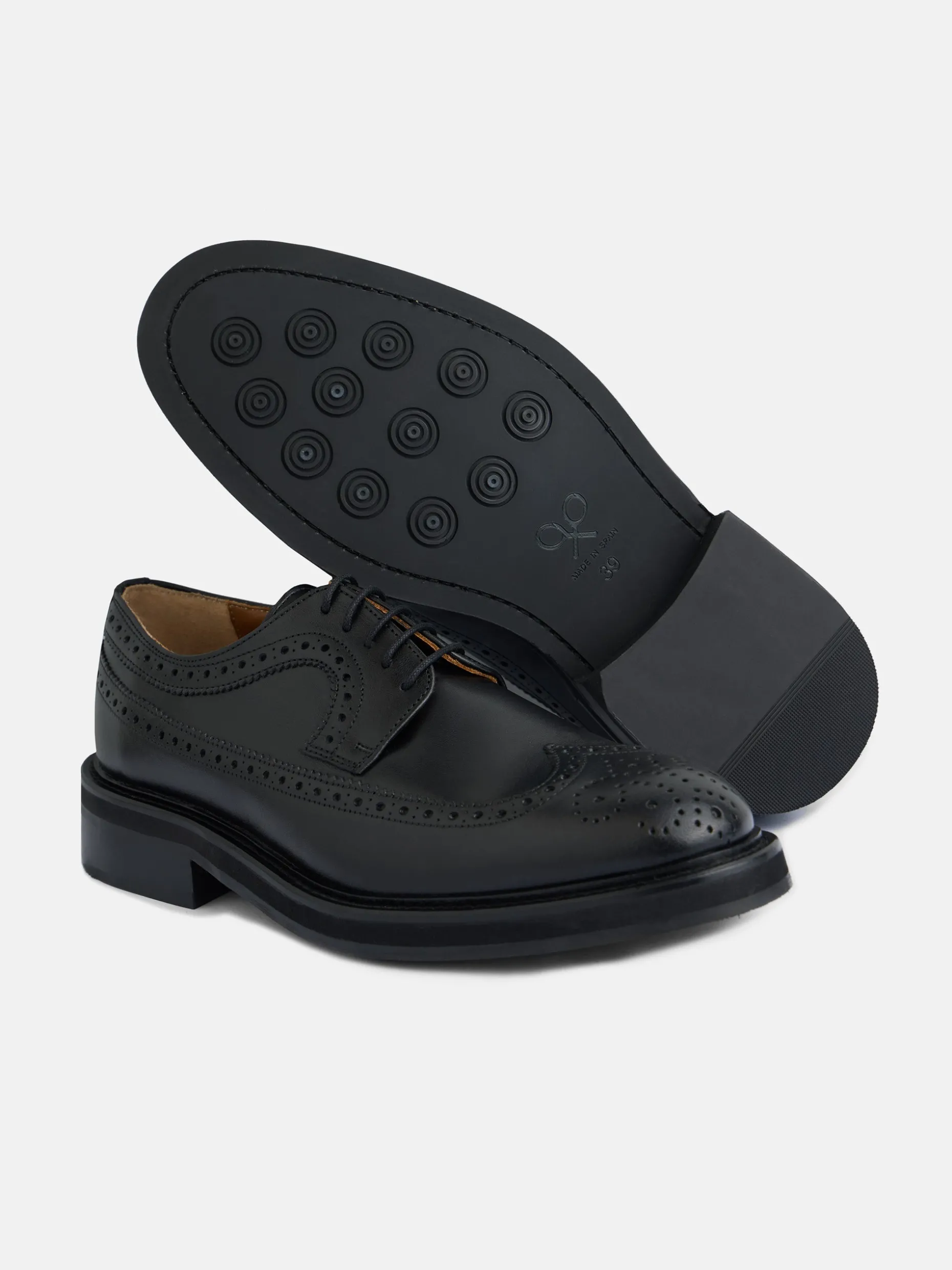 Zapato clasico piel perforado negro